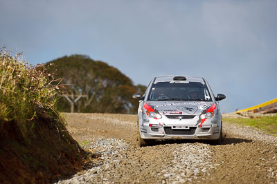 21;16-July-2011;21;APRC;Akira-Bamba;Asia-Pacific-Rally-Championship;International-Rally-Of-Whangarei;NZ;New-Zealand;Northland;Proton-Cusco-Rally-Team;Proton-Satria-Neo;Rally;Takahiro-Yasui;Whangarei;auto;garage;motorsport;racing;special-stage;super-telephoto