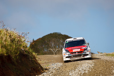 25;16-July-2011;25;APRC;Asia-Pacific-Rally-Championship;Chris-West;Erin-Kyle;International-Rally-Of-Whangarei;Mitsubishi-Lancer-Evolution-IX;NZ;New-Zealand;Northland;Rally;Whangarei;auto;garage;motorsport;racing;special-stage;super-telephoto