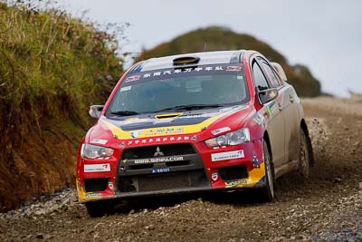 19;16-July-2011;19;APRC;Asia-Pacific-Rally-Championship;Fan-Fan;International-Rally-Of-Whangarei;Junwei-Fang;Mitsubishi-Lancer-Evolution-X;NZ;New-Zealand;Northland;Rally;Soueast-Motor-Kumho-Team;Whangarei;auto;garage;motorsport;racing;special-stage;super-telephoto