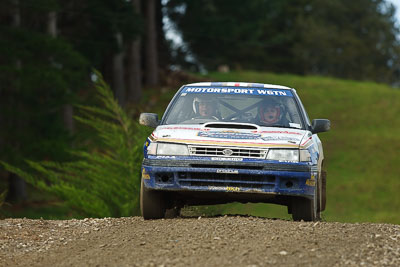 77;16-July-2011;77;APRC;Asia-Pacific-Rally-Championship;International-Rally-Of-Whangarei;Kylee-Smith;Marty-Smith;NZ;New-Zealand;Northland;Rally;Subaru-Legacy-RS;Whangarei;auto;garage;motorsport;racing;special-stage;super-telephoto