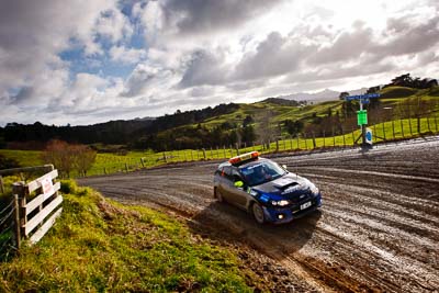 0;0;16-July-2011;APRC;Asia-Pacific-Rally-Championship;International-Rally-Of-Whangarei;NZ;New-Zealand;Northland;Rally;Safety-Car;Subaru-Impreza-WRX;Whangarei;auto;clouds;garage;motorsport;racing;sky;wide-angle