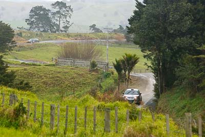 21;16-July-2011;21;APRC;Akira-Bamba;Asia-Pacific-Rally-Championship;International-Rally-Of-Whangarei;NZ;New-Zealand;Northland;Proton-Cusco-Rally-Team;Proton-Satria-Neo;Rally;Takahiro-Yasui;Whangarei;auto;garage;motorsport;racing;special-stage;telephoto