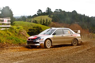 25;16-July-2011;25;APRC;Asia-Pacific-Rally-Championship;Chris-West;Erin-Kyle;International-Rally-Of-Whangarei;Mitsubishi-Lancer-Evolution-IX;NZ;New-Zealand;Northland;Rally;Whangarei;auto;garage;motorsport;racing;special-stage;telephoto