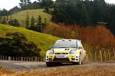 30;16-July-2011;30;APRC;Asia-Pacific-Rally-Championship;Bruce-McKenzie;Dave-Strong;Ford-Fiesta-S2000;International-Rally-Of-Whangarei;NZ;New-Zealand;Northland;Rally;Whangarei;auto;garage;motorsport;racing;special-stage;telephoto