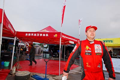 16-July-2011;APRC;Asia-Pacific-Rally-Championship;International-Rally-Of-Whangarei;NZ;New-Zealand;Northland;Rally;Richard-Mason;Whangarei;auto;garage;motorsport;portrait;racing;service-park;wide-angle