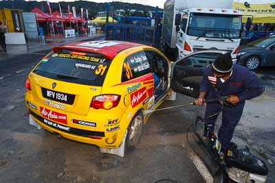 31;16-July-2011;31;APRC;Asia-Pacific-Rally-Championship;International-Rally-Of-Whangarei;Musa-Sherif;NZ;New-Zealand;Northland;Pennzoil-GSR-Racing-Team;Rally;Sanjay-Ram-Takle;Whangarei;auto;garage;motorsport;racing;service-park;wide-angle