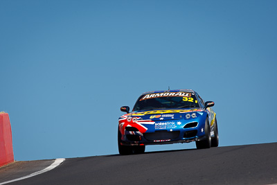 32;24-February-2012;Australia;Bathurst;Bathurst-12-Hour;Gerry-Murphy;Jim-Pollicina;Mazda-RX‒7;Mazda-RX7;Michael-Caine;Mt-Panorama;NSW;New-South-Wales;auto;endurance;motorsport;racing;sky;super-telephoto