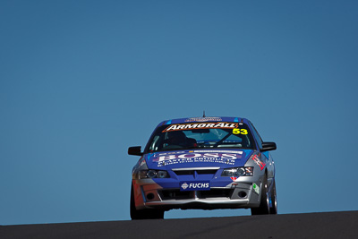 53;24-February-2012;Australia;Bathurst;Bathurst-12-Hour;Dean-Lillie;Holden-HSV-GTS;James-Atkinson;Mt-Panorama;NSW;New-South-Wales;Rick-Newman;auto;endurance;motorsport;racing;sky;super-telephoto