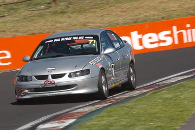 71;25-February-2012;71;Australia;Bathurst;Bathurst-12-Hour;Holden-Commodore-VT;Mt-Panorama;NSW;New-South-Wales;Robert-Kronberger;Saloon-Cars;auto;endurance;motion-blur;motorsport;racing;super-telephoto