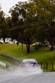 53;26-February-2012;Australia;Bathurst;Bathurst-12-Hour;Dean-Lillie;Holden-HSV-GTS;James-Atkinson;Mt-Panorama;NSW;New-South-Wales;Rick-Newman;auto;endurance;motorsport;racing;rain;telephoto;wet