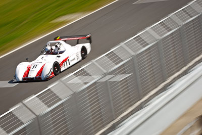 51;22-September-2012;51;Andrew-MacPherson;Australia;Phillip-Island;Radical;Shannons-Nationals;VIC;Victoria;atmosphere;auto;fence;motion-blur;motorsport;pitlane;racing;telephoto