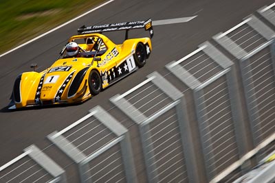 1;1;22-September-2012;Australia;Edward-Singleton;Phillip-Island;Radical;Shannons-Nationals;VIC;Victoria;auto;fence;motion-blur;motorsport;racing;telephoto