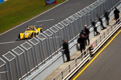 1;1;22-September-2012;Australia;Edward-Singleton;Phillip-Island;Radical;Shannons-Nationals;VIC;Victoria;auto;fence;motion-blur;motorsport;racing;telephoto