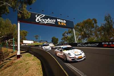 67;67;8-February-2013;Australia;Bathurst;Bathurst-12-Hour;David-Glasson;Grand-Tourer;Motorsport-Services;Mt-Panorama;NSW;New-South-Wales;Phil-Hood;Porsche-911-GT3-Cup-997;The-Dipper;Tony-Richards;auto;endurance;motorsport;racing;sky;wide-angle