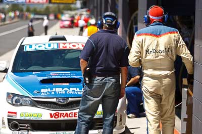 9-February-2013;Australia;Bathurst;Bathurst-12-Hour;Fire-Suit;Grand-Tourer;Grove-Group;Mt-Panorama;NSW;New-South-Wales;atmosphere;auto;endurance;mechanic;motorsport;paddock;portrait;racing;telephoto