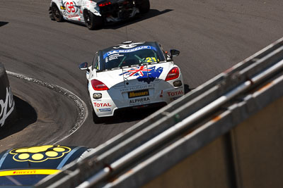 21;10-February-2013;21;Andrew-Jones;Australia;Bathurst;Bathurst-12-Hour;Bruce-Jouanny;David-Wall;Grand-Tourer;Mt-Panorama;NSW;New-South-Wales;Peugeot-RCZ-Cup;Team-Peugeot-RCZ;The-Dipper;auto;endurance;motorsport;racing;telephoto