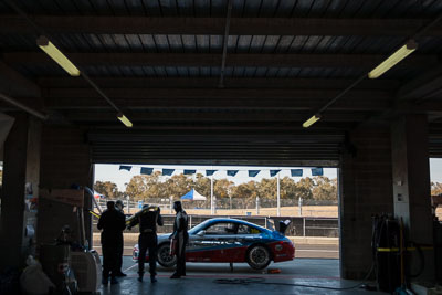 35;35;7-February-2014;Aaron-Zerefos;Andrew-Fisher;Australia;Bathurst;Bathurst-12-Hour;Indiran-Padayachee;NSW;New-South-Wales;Porsche-997-GT3-Cup;Ric-Shaw;SennheiserRentcorp-ForkliftsFiji-Water;atmosphere;auto;endurance;garage;motorsport;pitlane;racing;wide-angle