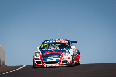 35;35;8-February-2014;Aaron-Zerefos;Andrew-Fisher;Australia;Bathurst;Bathurst-12-Hour;Indiran-Padayachee;NSW;New-South-Wales;Porsche-997-GT3-Cup;Ric-Shaw;SennheiserRentcorp-ForkliftsFiji-Water;auto;endurance;motorsport;racing;sky;super-telephoto