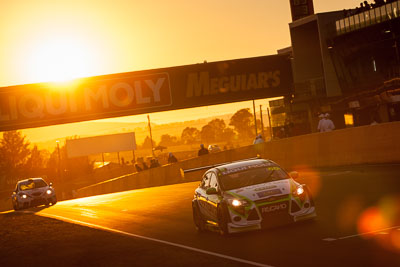 60;60;9-February-2014;Australia;Bathurst;Bathurst-12-Hour;Dylan-Thomas;Hadrian-Morrall;MARC-Focus-GTC;Mick-Benton;NSW;New-South-Wales;auto;endurance;motorsport;racing;sunrise;telephoto