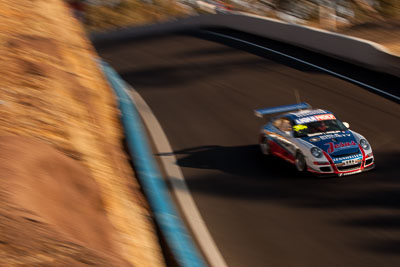 35;35;9-February-2014;Aaron-Zerefos;Andrew-Fisher;Australia;Bathurst;Bathurst-12-Hour;Indiran-Padayachee;NSW;New-South-Wales;Porsche-997-GT3-Cup;Ric-Shaw;SennheiserRentcorp-ForkliftsFiji-Water;auto;endurance;motion-blur;motorsport;racing;telephoto