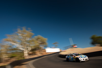 70;70;9-February-2014;Adam-Gowens;Australia;Bathurst;Bathurst-12-Hour;Garry-Jacobson;Grant-Denyer;MARC-Focus-GTC;NSW;New-South-Wales;auto;endurance;motion-blur;motorsport;racing;sky;wide-angle